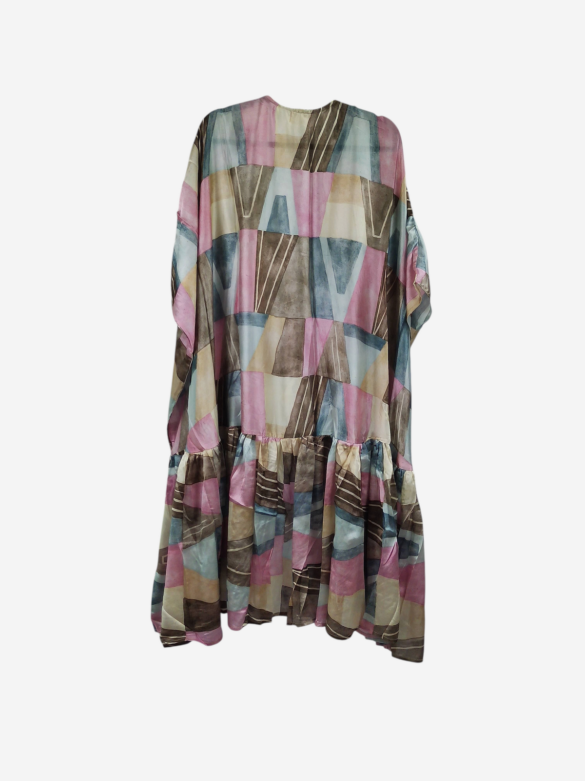 She Lives Beauty Winds of the Ancestors kimono in vintage rasgulla silk with a geometric pink, blue, and tan pattern.