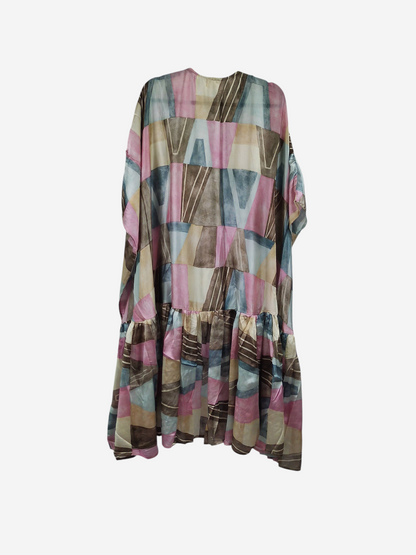 She Lives Beauty Winds of the Ancestors kimono in vintage rasgulla silk with a geometric pink, blue, and tan pattern.