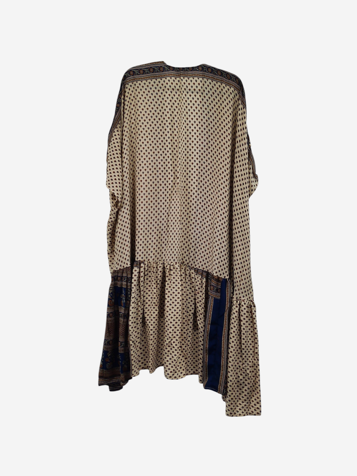 She Lives Beauty Winds of the Ancestors kimono in beige Rasgulla silk with blue patterned border and drop-waist hem.