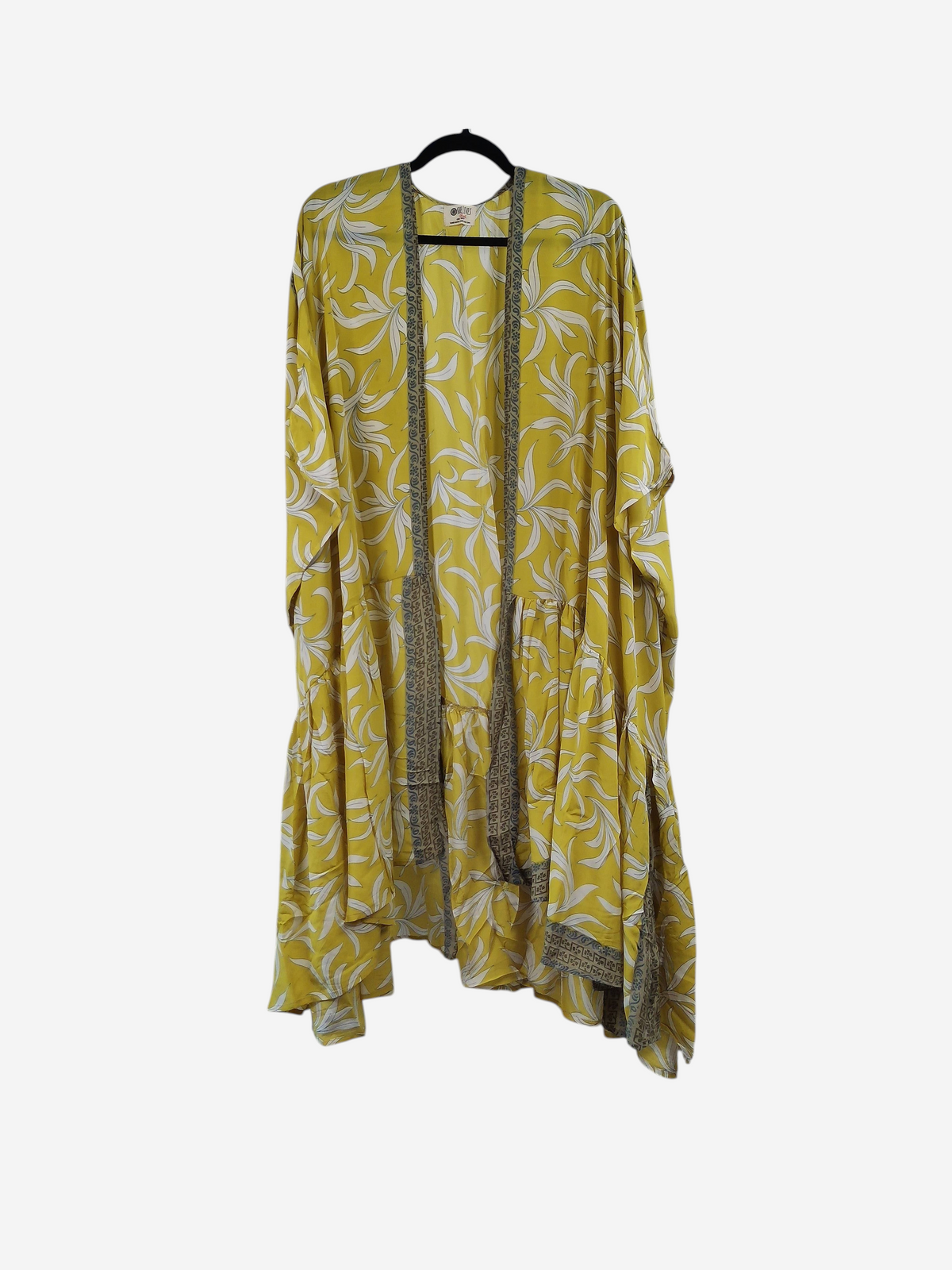 She Lives Beauty Winds of the Ancestors kimono in yellow vintage Rasgulla silk with white leaf pattern on a hanger