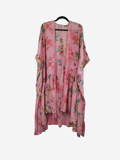 She Lives Beauty Winds of the Ancestors kimono in pink vintage Rasgulla silk with a floral pattern and flowing drape.