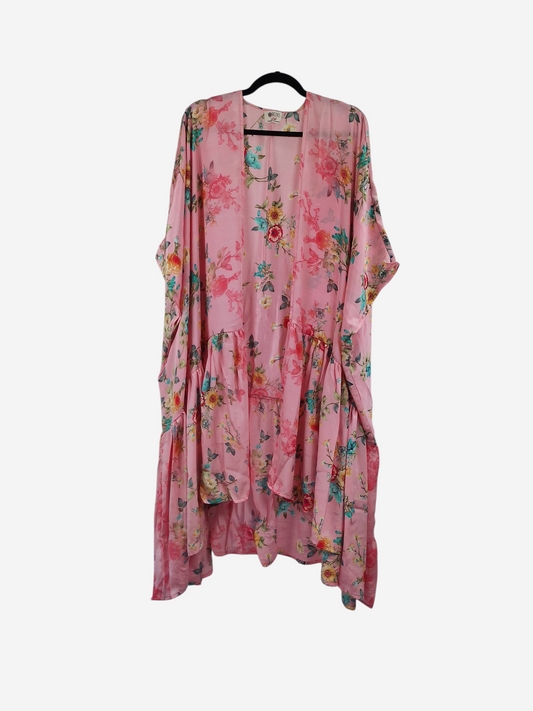 She Lives Beauty Winds of the Ancestors kimono in pink vintage Rasgulla silk with a floral pattern and flowing drape.