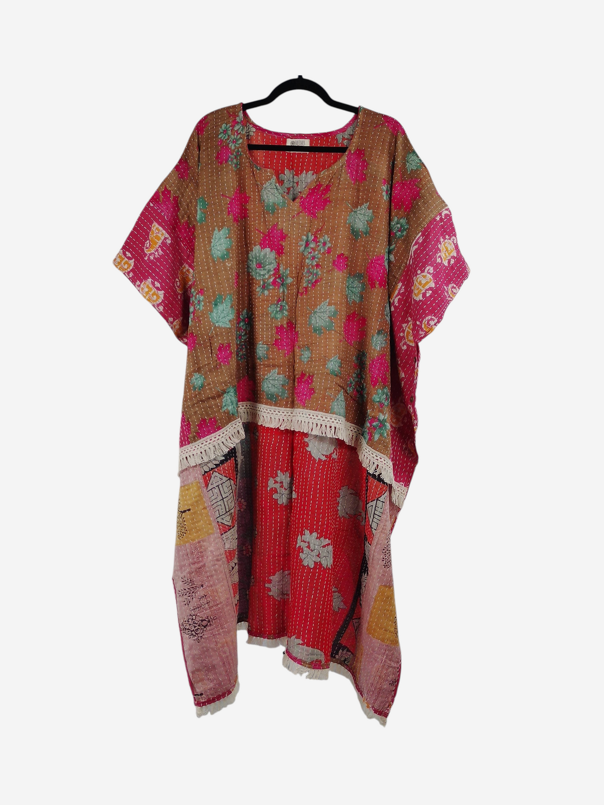 She Lives Beauty La Isla Bonita reversible kantha top in vintage cotton with floral patterns and fringe detailing.