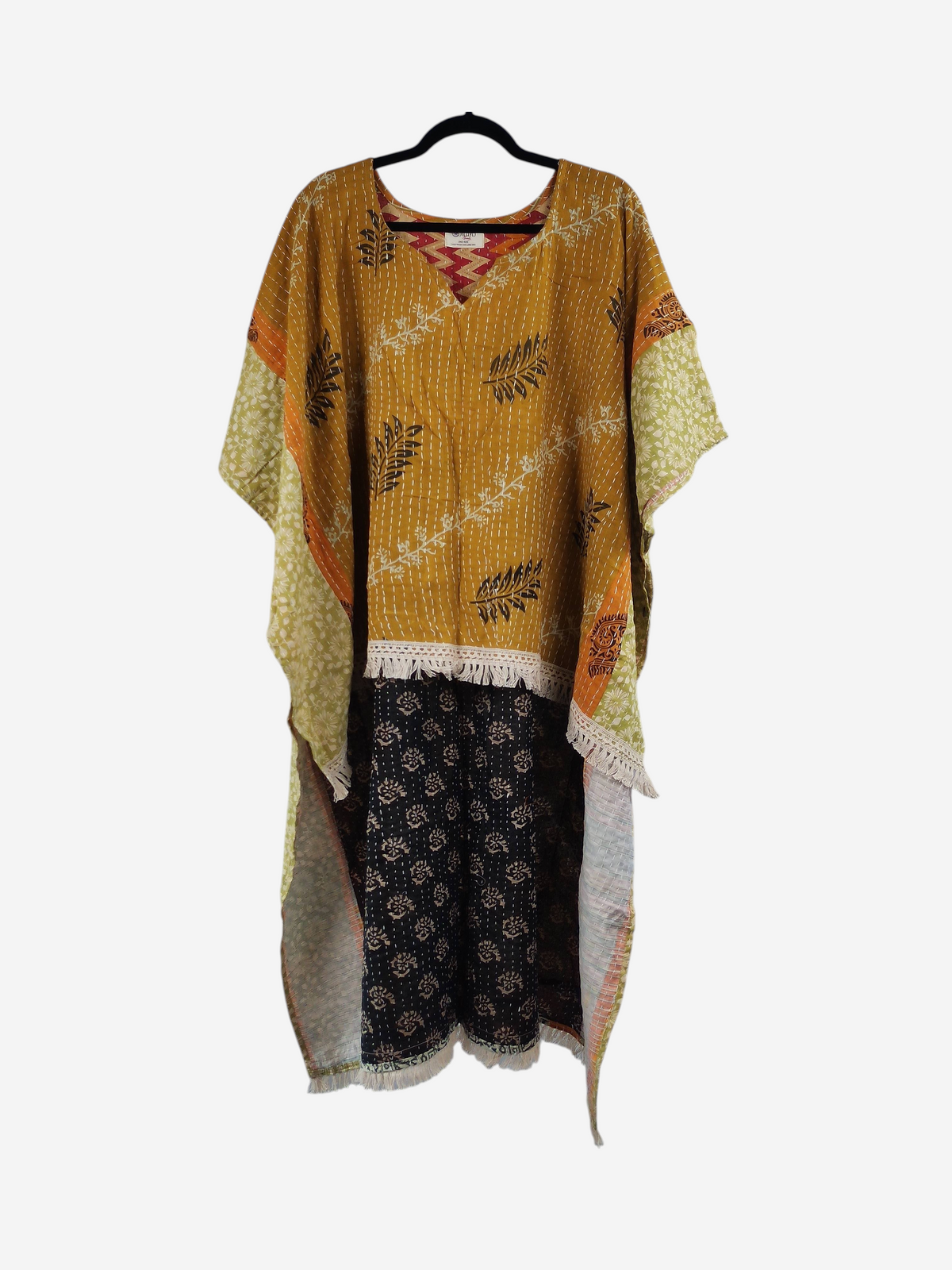 She Lives Beauty reversible La Isla Bonita Kantha top in mustard and black vintage cotton with fringe detailing