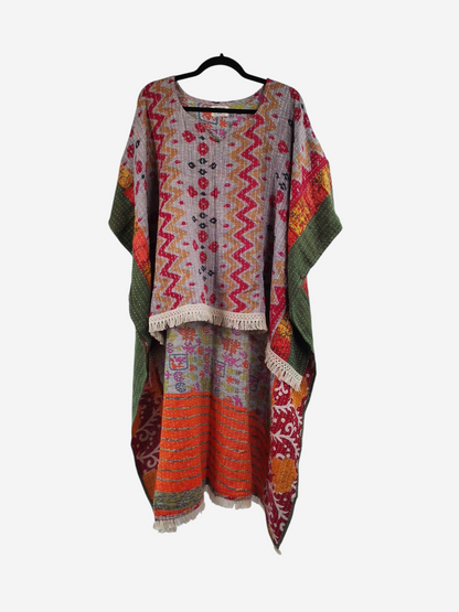 She Lives Beauty La Isla Bonita reversible kantha top made from vintage cotton with fringe and colorful patterns.