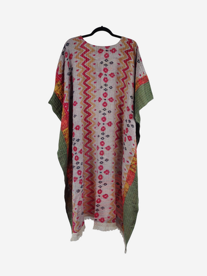 She Lives Beauty La Isla Bonita reversible kantha top in vintage cotton with colorful patterns and fringe trim.
