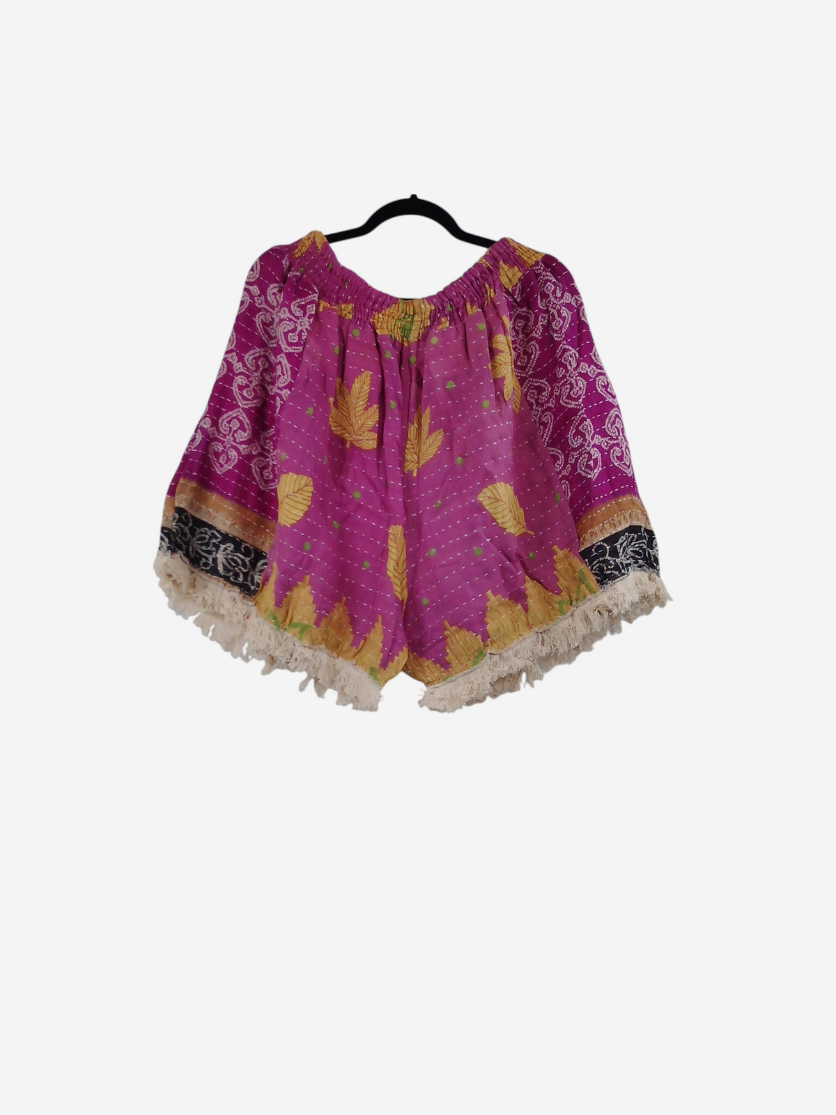 She Lives Beauty Alma Kantha fringe shorts in vibrant pink vintage cotton with yellow leaf patterns and boho trim.