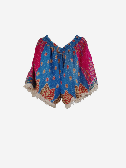 She Lives Beauty Alma Kantha fringe shorts in vibrant blue and pink vintage cotton with unique boho stitched patterns.