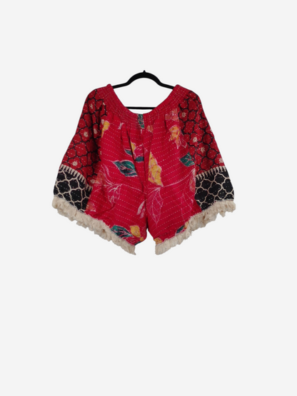 She Lives Beauty Alma Kantha fringe shorts in red vintage cotton with floral patterns and cream tassel hem
