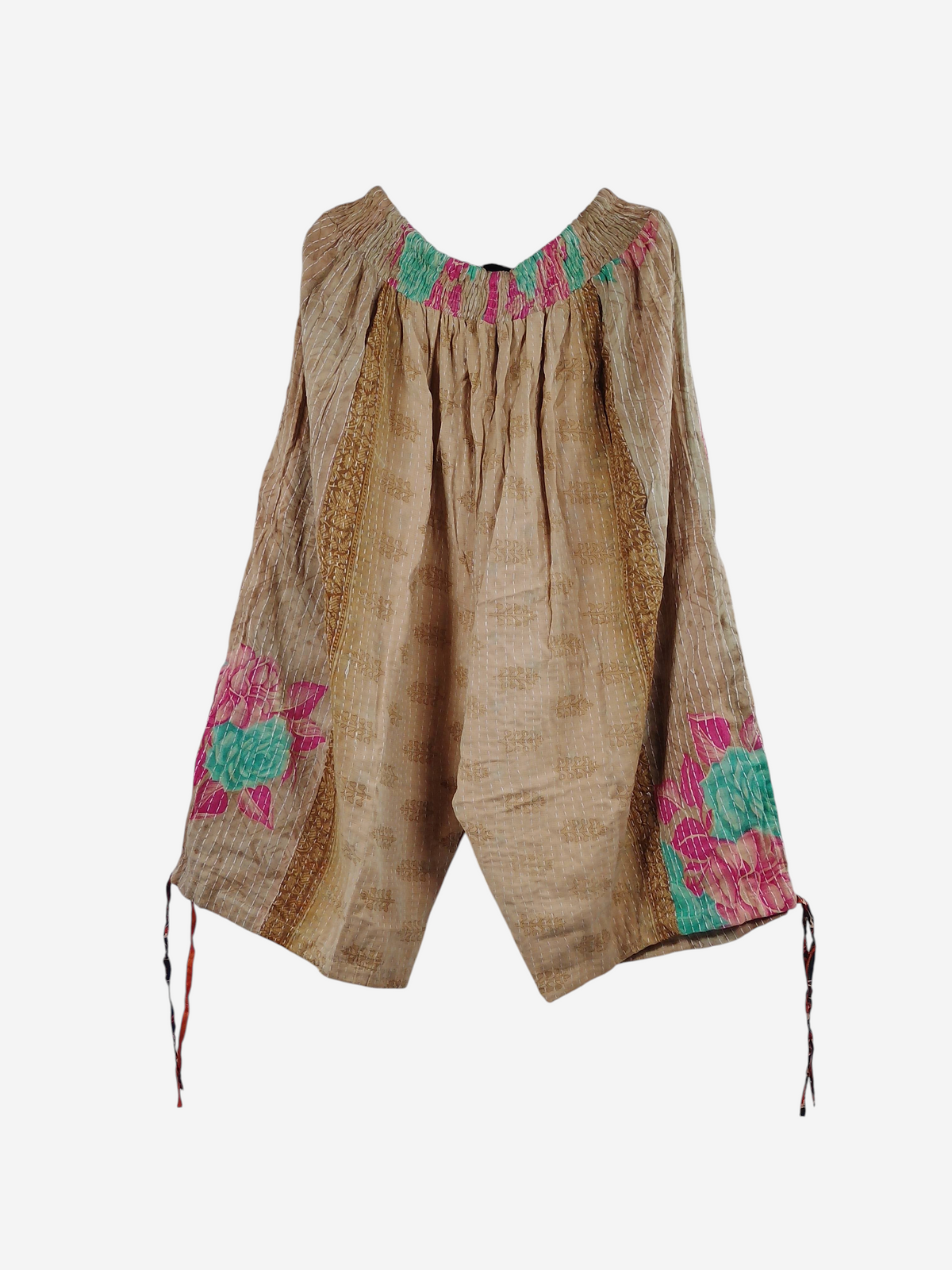 She Lives Beauty vintage cotton kantha capri joggers in beige with floral patterns and drawstring leg openings.