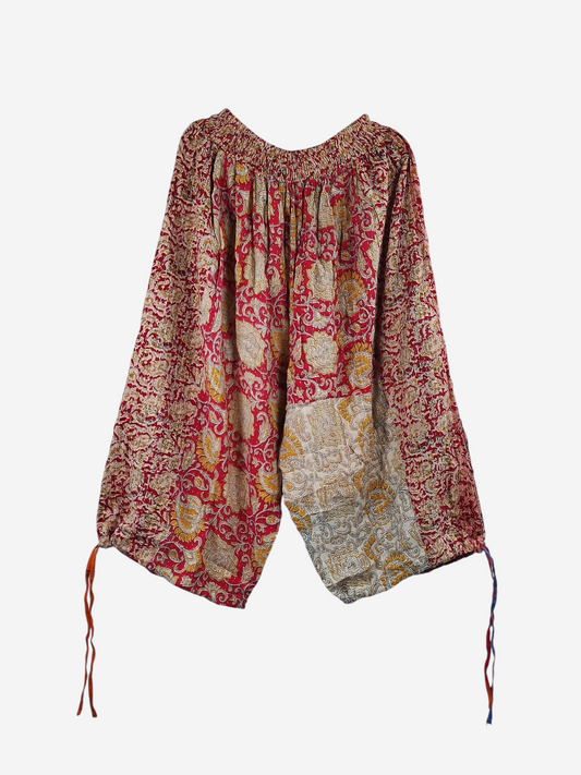 She Lives Beauty vintage cotton kantha capri joggers in red and yellow with bohemian floral patterns and tie cuffs.