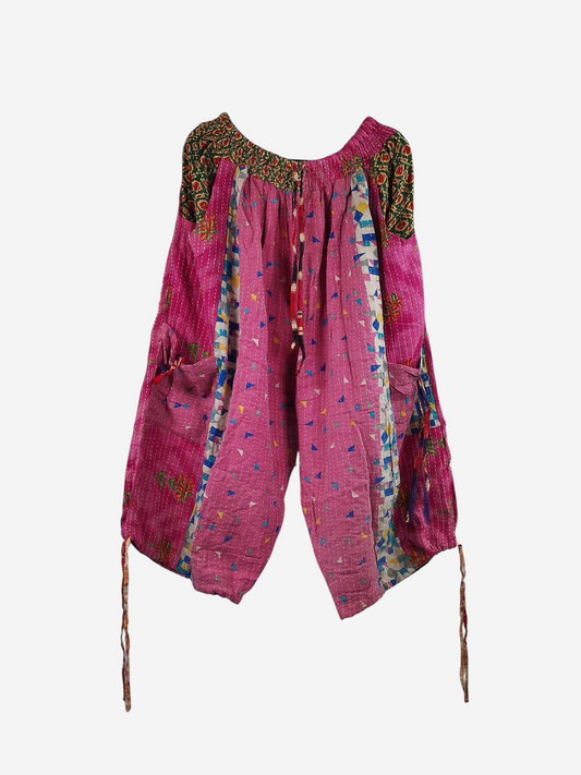 She Lives Beauty vintage cotton Kantha cargo joggers in vibrant pink with colorful patchwork and utility pockets.