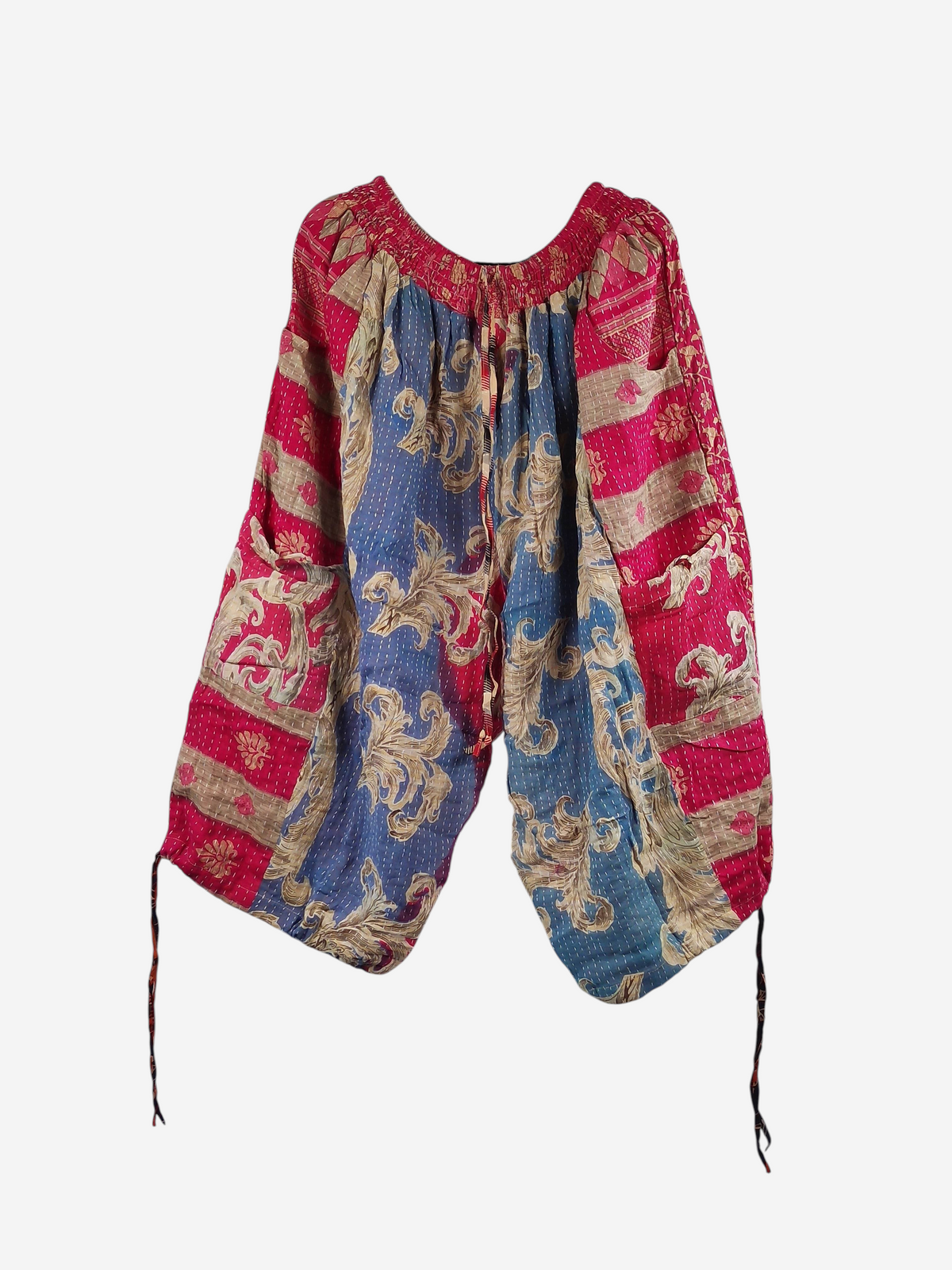 She Lives Beauty Roam Free capri joggers in vintage kantha cotton with red and blue floral patterns and cargo pockets.