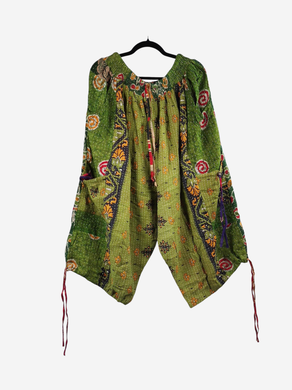 She Lives Beauty green vintage cotton kantha cargo joggers with colorful floral patterns and drawstring capri hems.