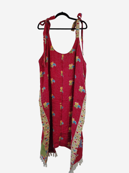 She Lives Beauty bohemian red floral kantha jumpsuit with tie straps and harem capri silhouette on a hanger