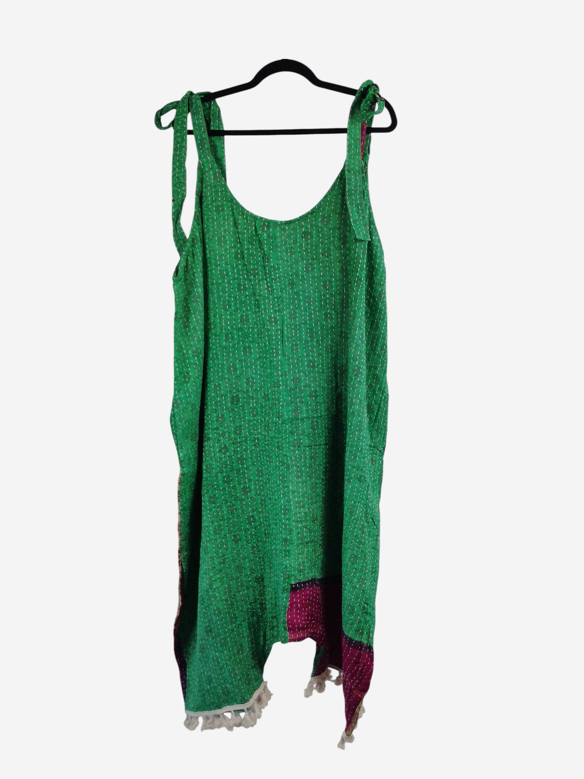 She Lives Beauty green vintage cotton kantha jumpsuit with harem silhouette and capri length on a hanger