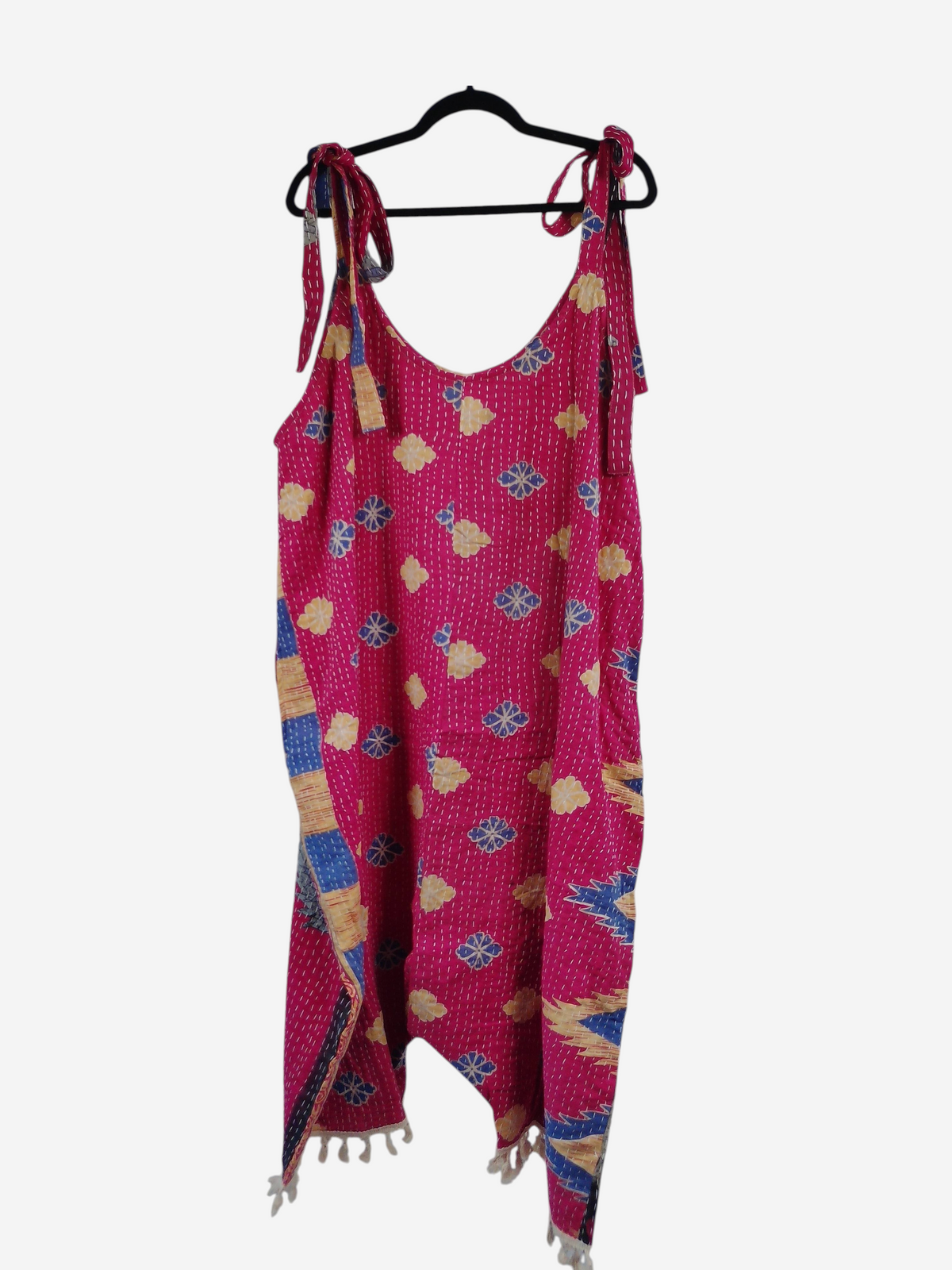 She Lives Beauty bohemian harem jumpsuit in pink vintage kantha cotton with blue and yellow floral patterns.