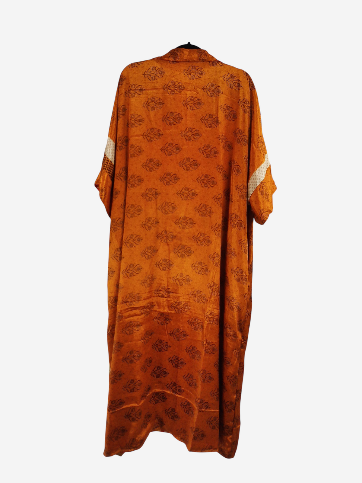 She Lives Beauty reversible kaftan in orange vintage rasgulla silk with a repeating leaf pattern and button front.
