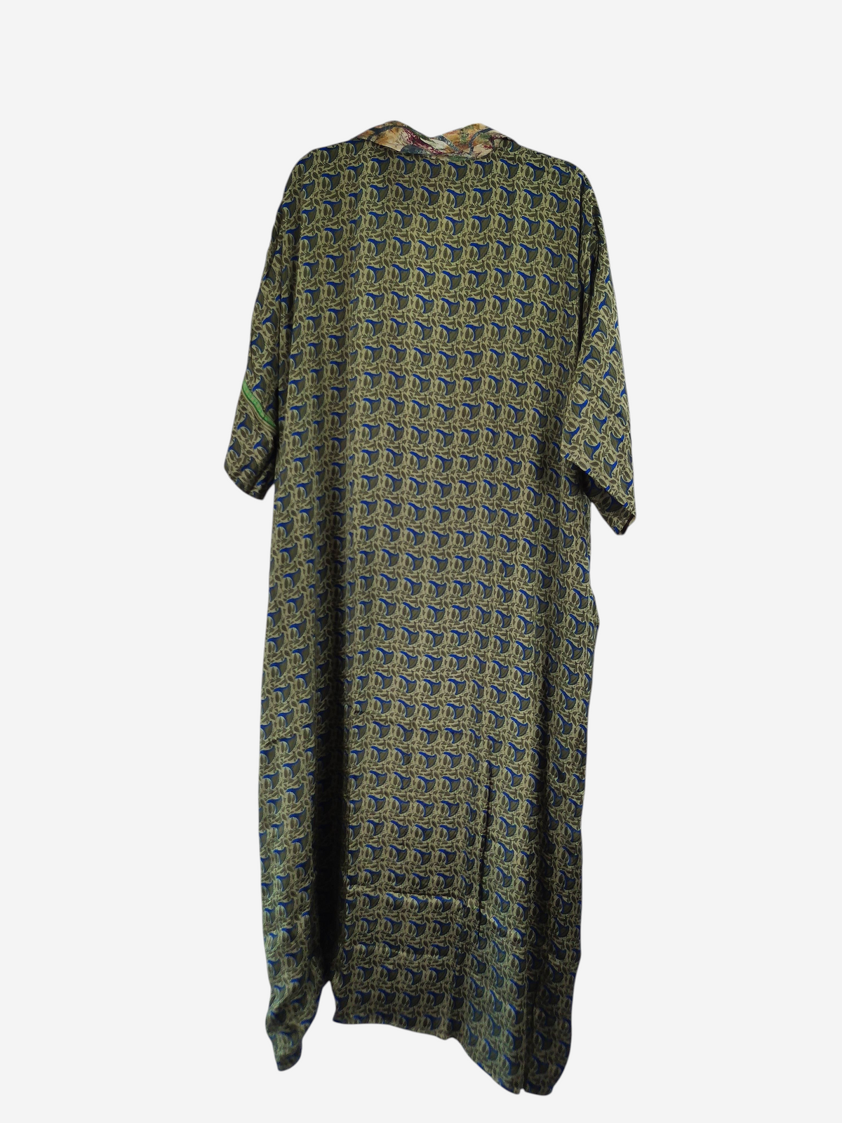 She Lives Beauty reversible kaftan in vintage rasgulla silk with a flowing silhouette and patterned green fabric.