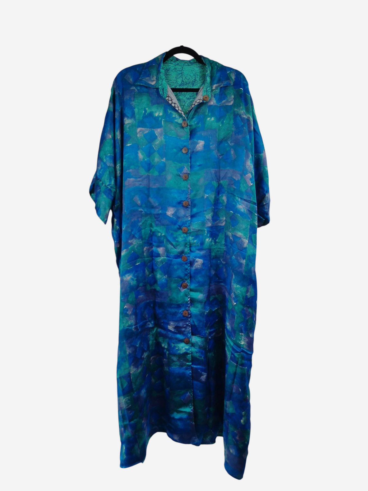 She Lives Beauty reversible kaftan in blue and green vintage rasgulla silk with a button-front design.