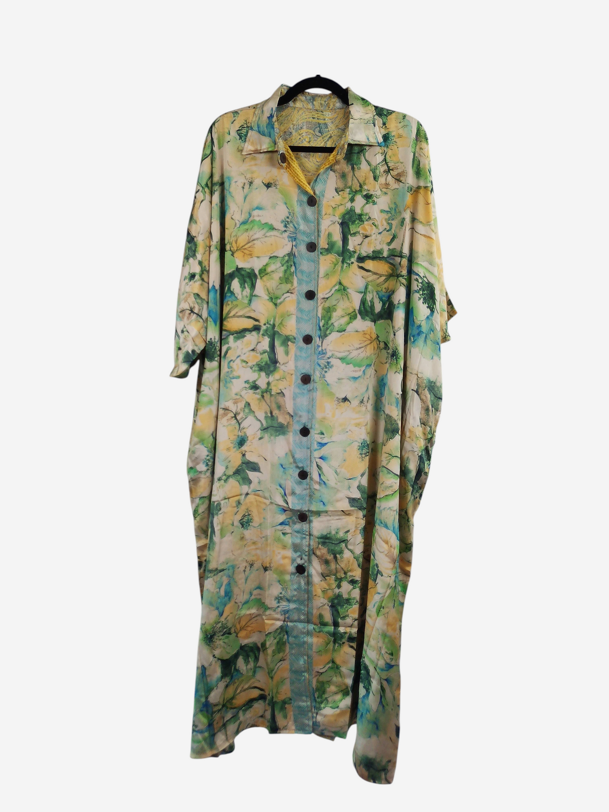 She Lives Beauty reversible kaftan in vintage floral Rasgulla silk with a button-front design and flowing silhouette.