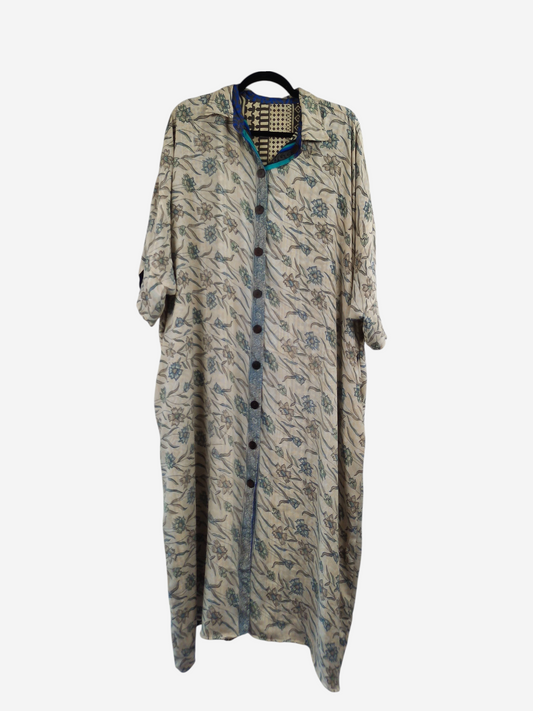 She Lives Beauty reversible kaftan in vintage floral Rasgulla silk with a button-front design and flowing silhouette.