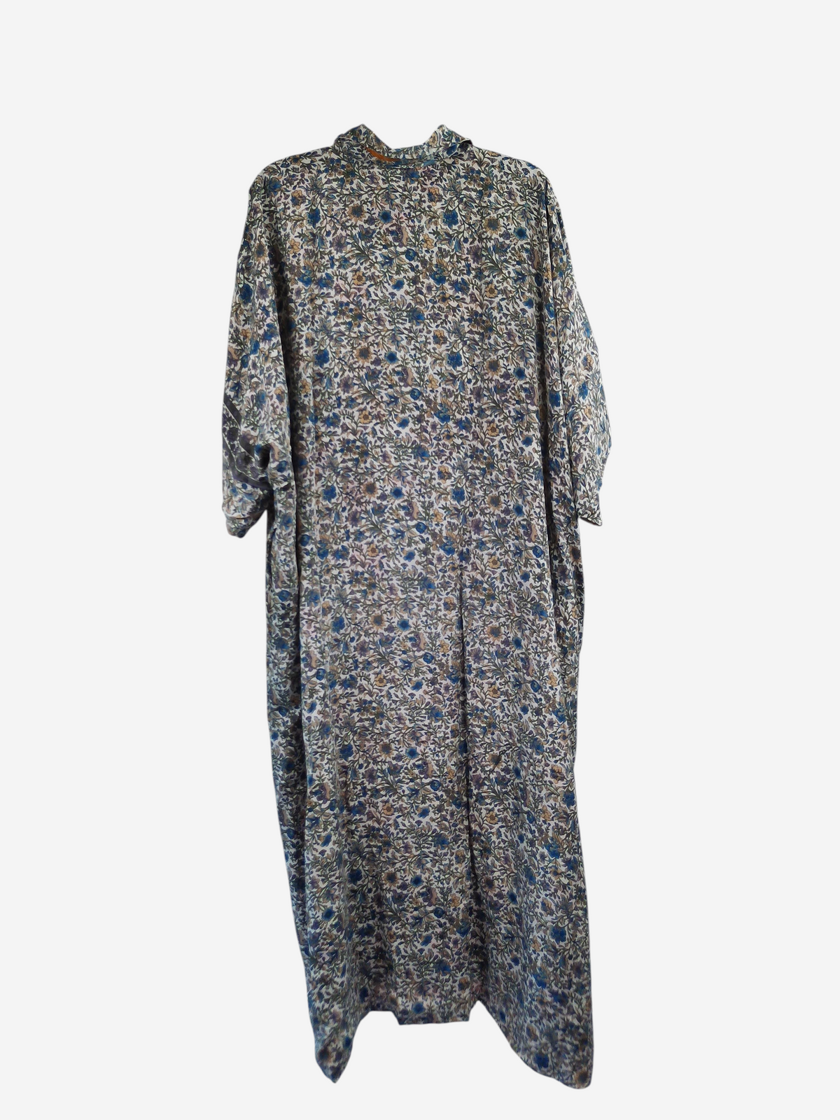 She Lives Beauty reversible kaftan in vintage floral rasgulla silk with a relaxed, flowing button-front silhouette.