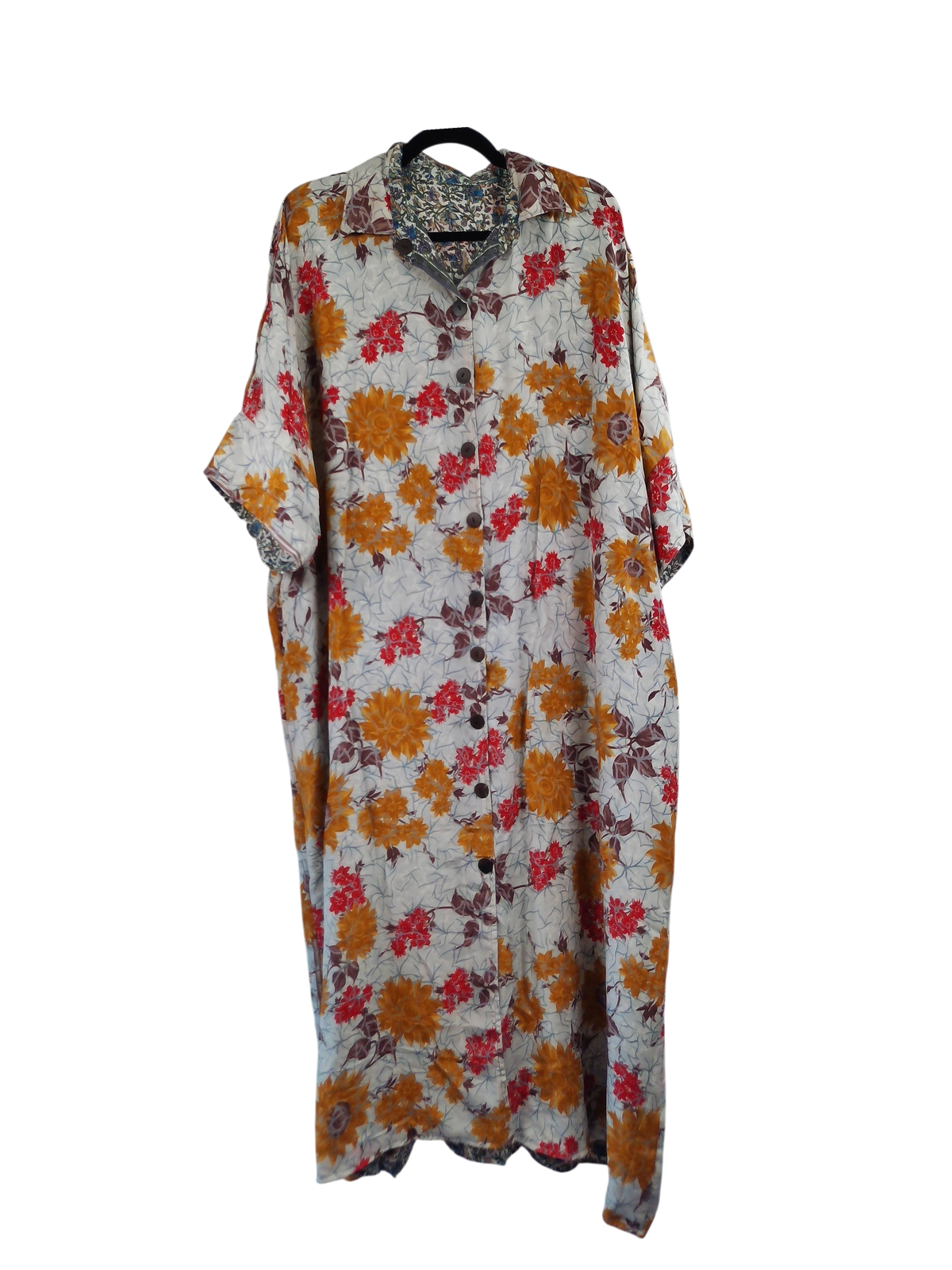 She Lives Beauty reversible kaftan in vintage floral Rasgulla silk with a button-front and relaxed bohemian fit.