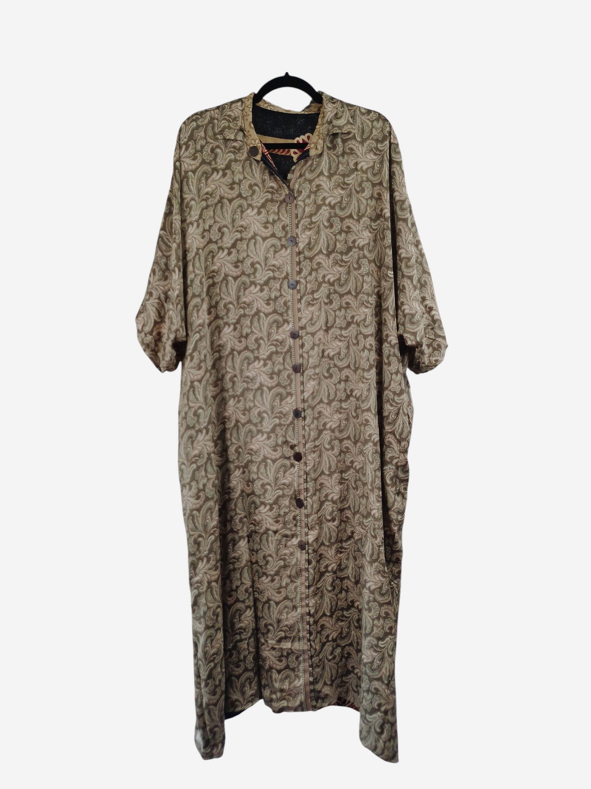 She Lives Beauty Riverstone reversible kaftan in vintage rasgulla silk with a button-front and paisley-like pattern.