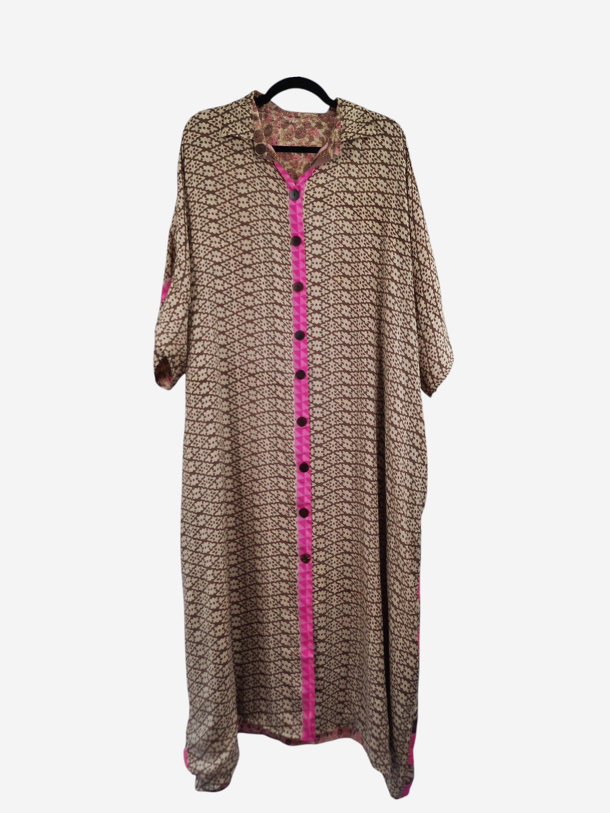 She Lives Beauty reversible kaftan in vintage brown patterned rasgulla silk with a vibrant pink button-front placket.