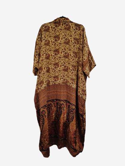 She Lives Beauty reversible kaftan in vintage rasgulla silk with a brown and gold paisley print on a hanger.