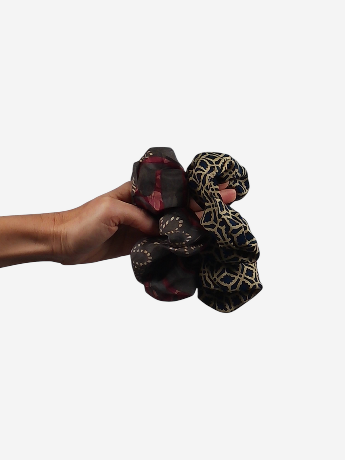 Hand held She Lives Beauty large vintage rasgulla silk scrunchies with unique geometric and floral patterns