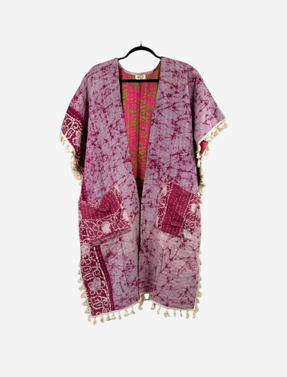 She Lives Beauty vintage cotton kantha kimono in purple and pink with short sleeves, fringe trim, and open front.