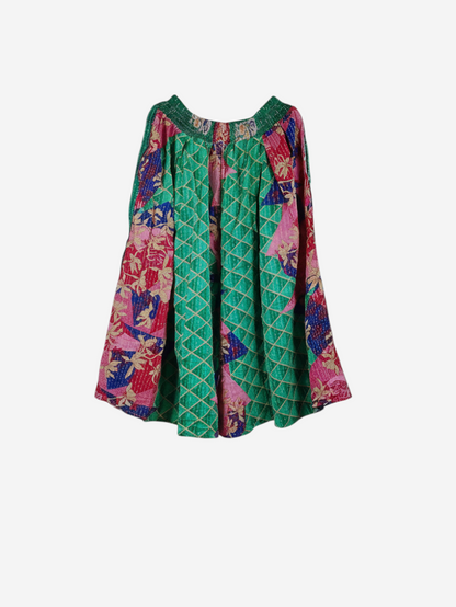 She Lives Beauty Pachuco Kantha capri pants in vibrant green and pink vintage cotton with intricate stitched patterns.