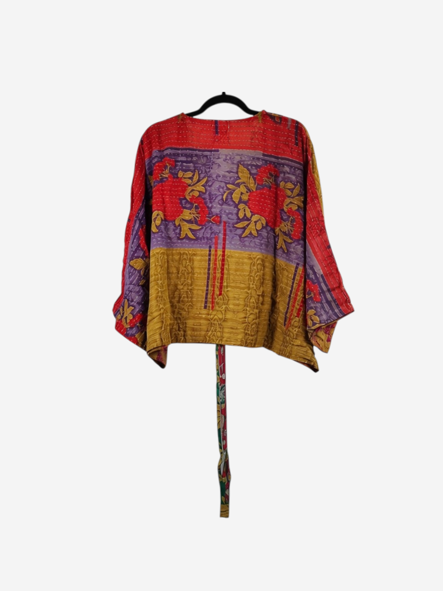 She Lives Beauty Sunrise Hana butterfly top in vibrant vintage kantha cotton with floral patterns and flowing sleeves.