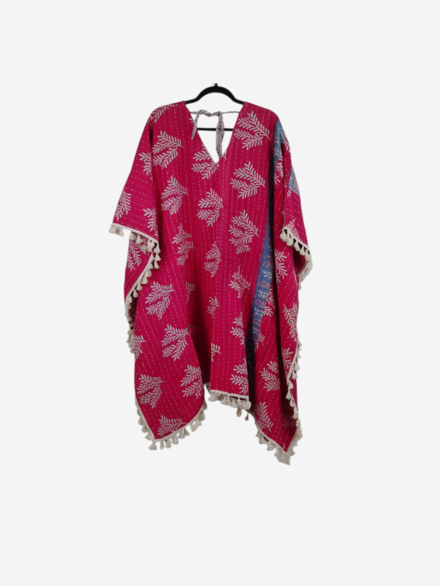 She Lives Beauty reversible pink kantha kimono with white leaf print, long sleeves, and decorative fringe trim.