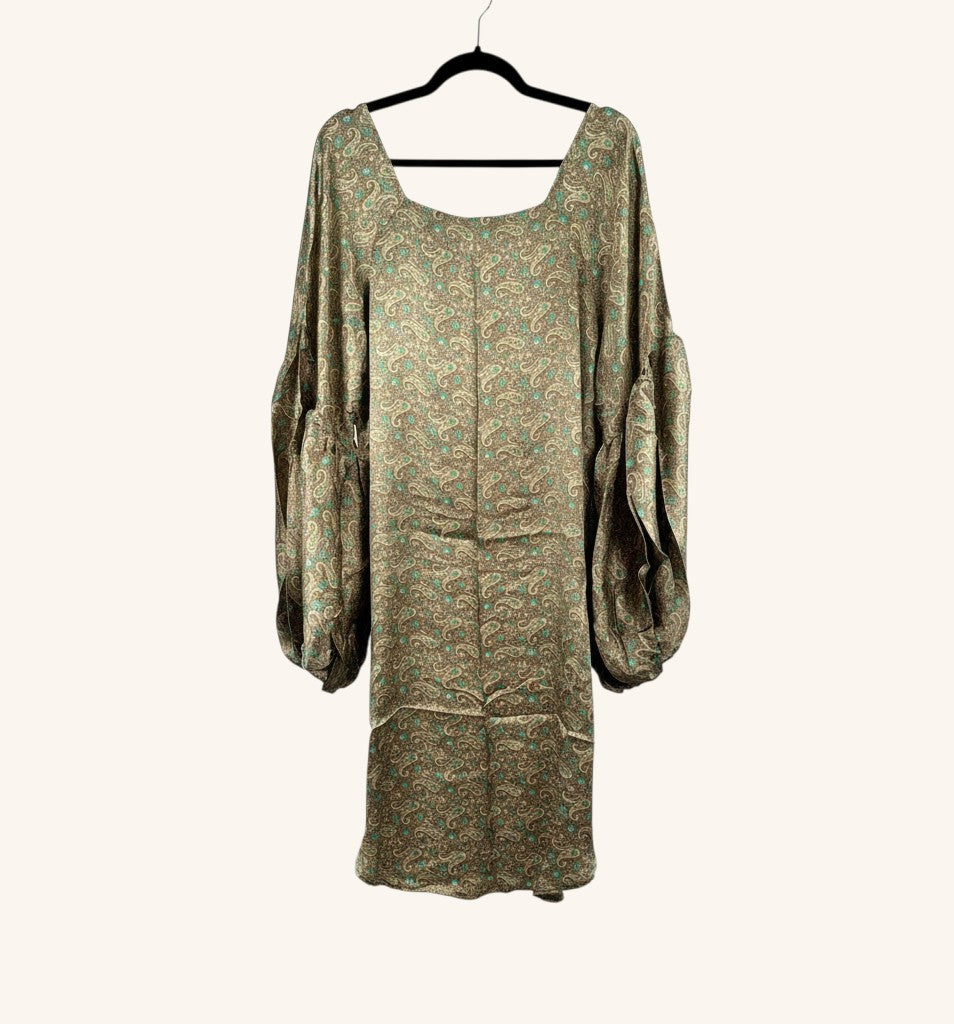 She Lives Beauty Desert Rain silk top with paisley print, oversized ruffle sleeves, and a flowing hi-low silhouette.