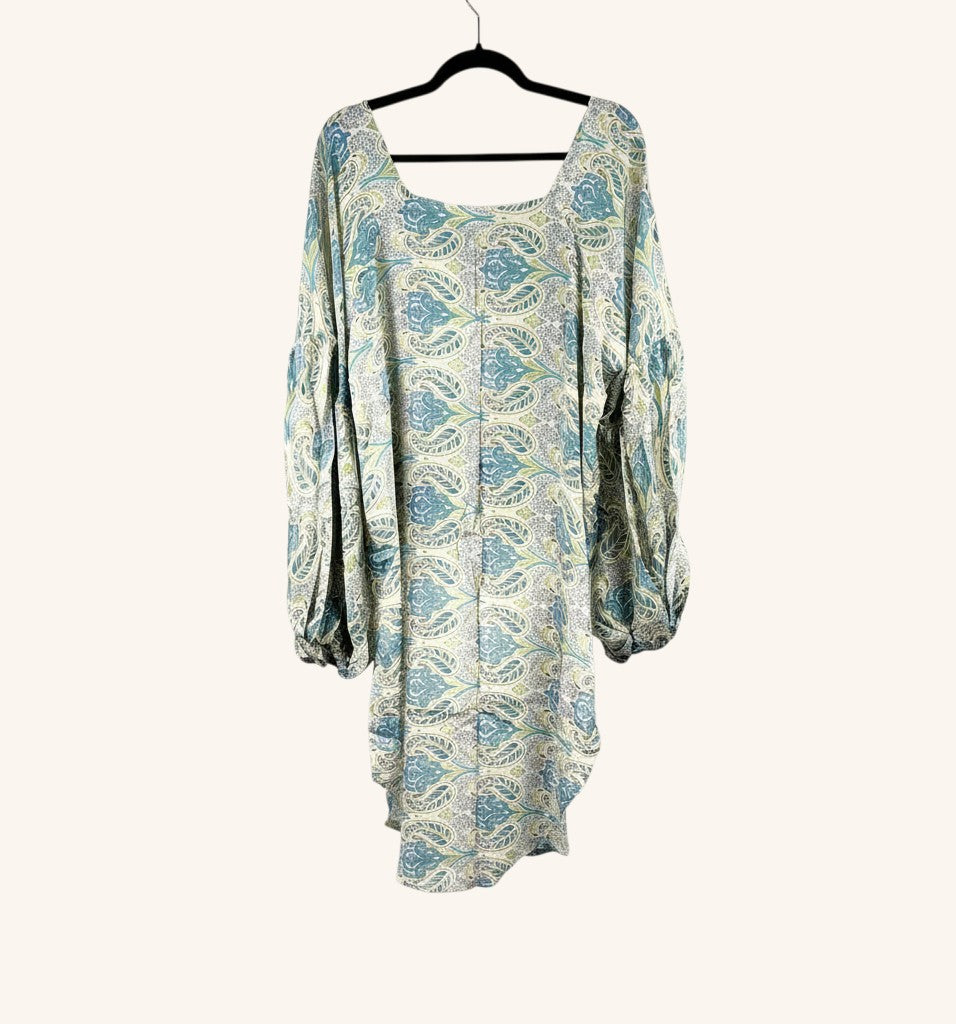 She Lives Beauty Desert Rain silk top in blue and cream paisley print with oversized ruffle sleeves and hi-low hem.