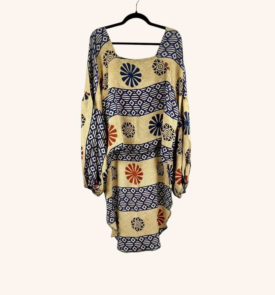 She Lives Beauty Desert Rain silk top with vintage kantha stitch, oversized ruffle sleeves, and geometric floral print.