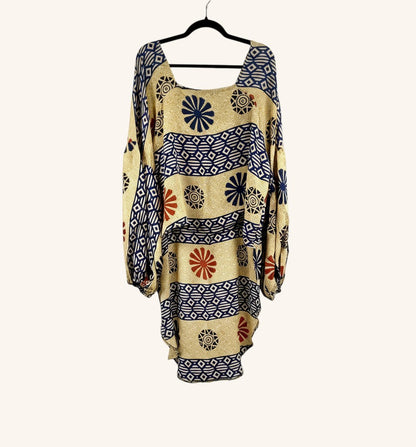 She Lives Beauty Desert Rain silk top with vintage kantha stitch, oversized ruffle sleeves, and geometric floral print.