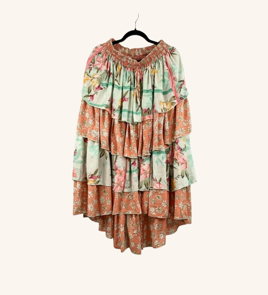 She Lives Beauty Ruffle Muse hi-lo skirt in vintage floral Rasgulla silk with cascading tiered ruffles.