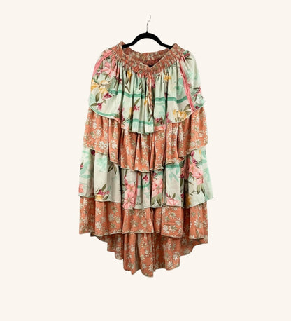 She Lives Beauty Ruffle Muse hi-lo skirt in vintage floral Rasgulla silk with cascading tiered ruffles.