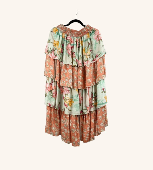 She Lives Beauty Ruffle Muse hi-lo skirt in vintage floral Rasgulla silk with cascading tiered ruffles.