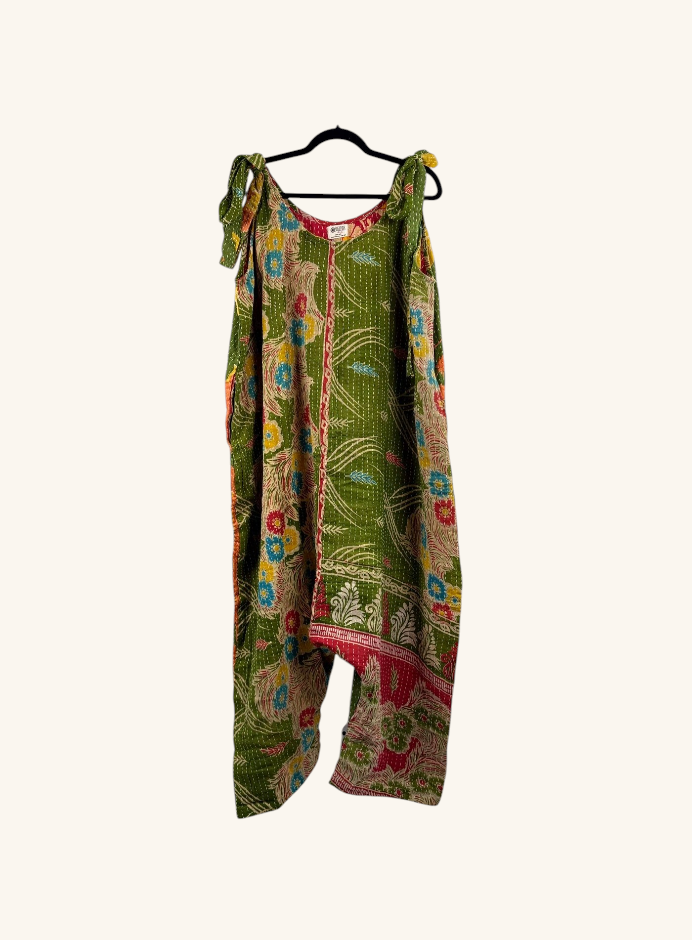She Lives Beauty Becoming Wild harem jumpsuit in green vintage kantha cotton with floral patterns and tie shoulders