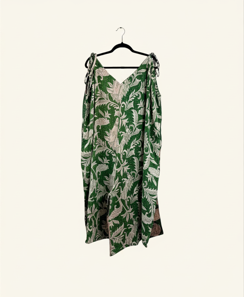 She Lives Beauty Sacred Journey Kantha jumpsuit in green vintage cotton with white floral print and tie straps.