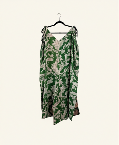 She Lives Beauty Sacred Journey Kantha jumpsuit in green vintage cotton with white floral print and tie straps.