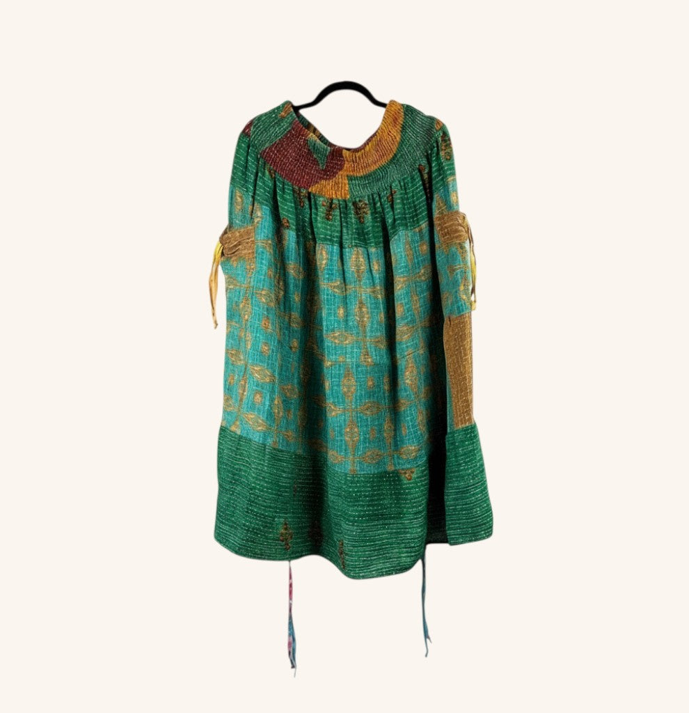 She Lives Beauty Earthbound midi skirt in green vintage kantha cotton with adjustable front leg cinches