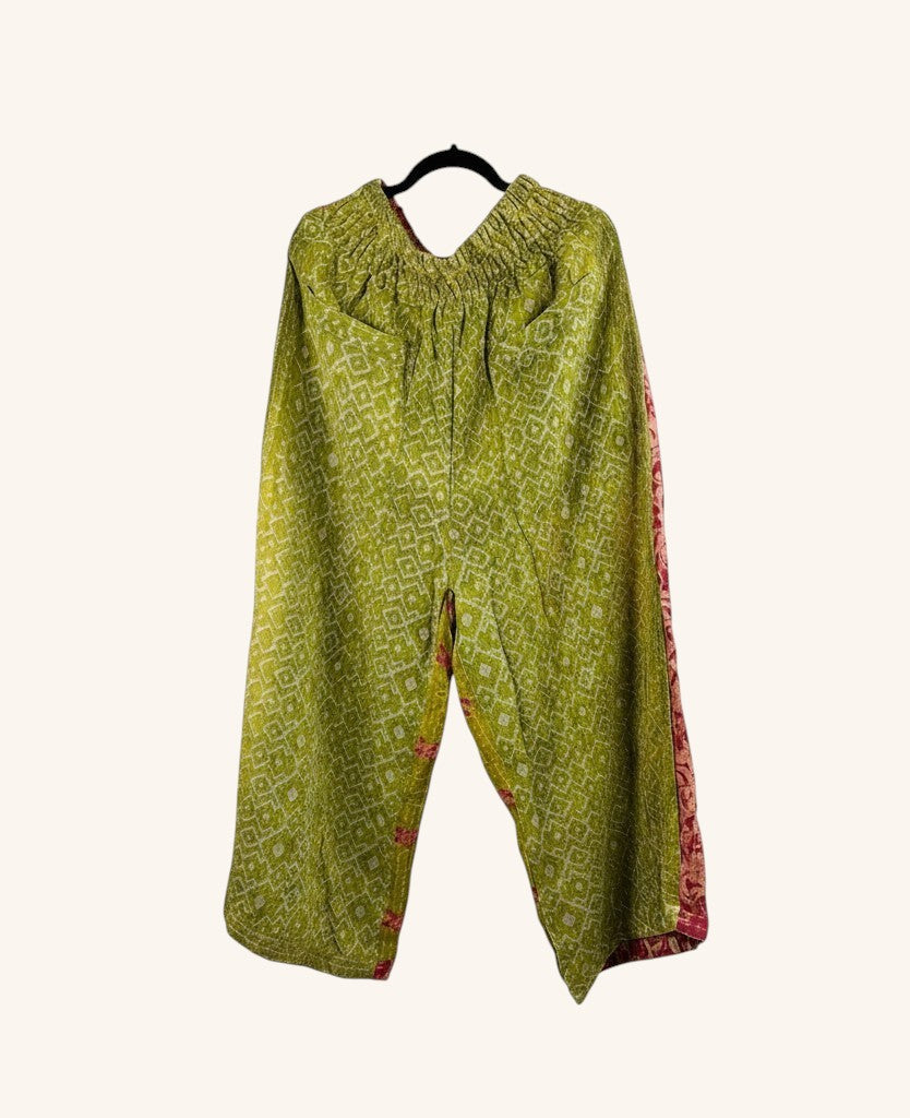 She Lives Beauty wide-leg pants in green vintage kantha cotton with patchwork details and an elastic waistband.