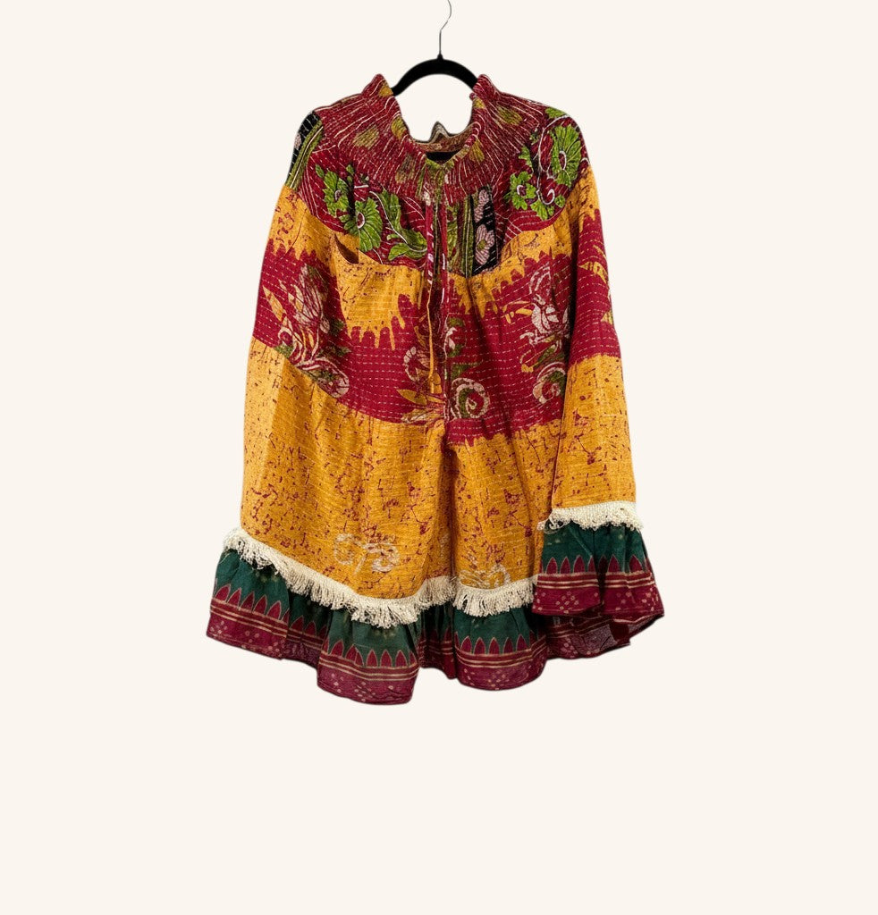 She Lives Beauty Tribal Soul Kantha bloomers in vintage cotton with red, yellow, and green patterns and fringe hem.