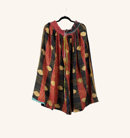She Lives Beauty Pachuco Kantha capri pants in vintage cotton with red, black, and gold patterned sari fabric.